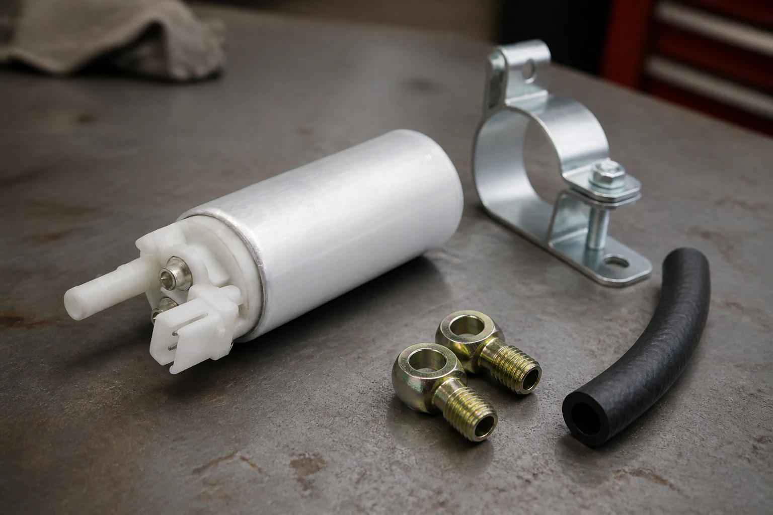 Fuel Lift Pump Procurement: Define the Component Before You Source It Diesel fuel pump module on a bench with mounting bracket, banjo fittings and fuel hose