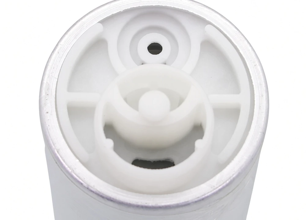 Outlet barbs on the plastic end of an electric canister pump